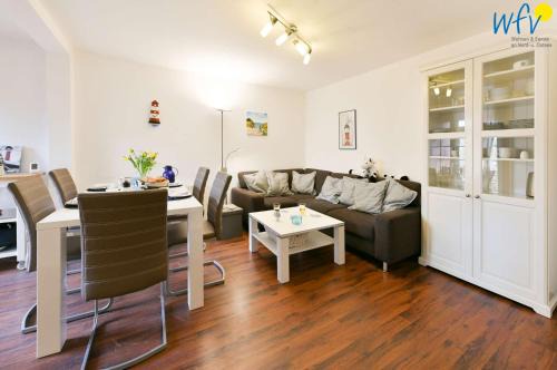 Wangerooge Apartment | Familienhaus im Dorfgroden 27 Ferienwohnung Zugvogel