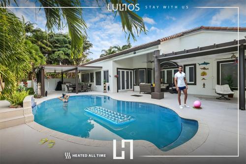 Palmetto Bay House | Family 4BR Escape Pool Arcade Sleeps 12 L57