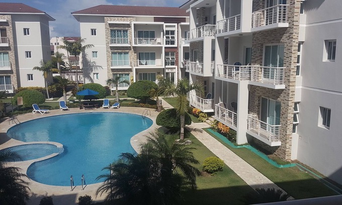 La Esplanada Apartment | Family-friendly 3BD central Sosua condo wih large pool, WIFI, BBQ, A/C, Cable TV