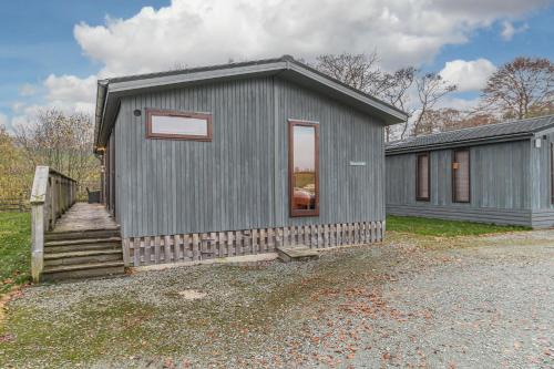 Hawkshead Ski Chalet | Family friendly, lovely Lakeland lodge with private parking and a patio