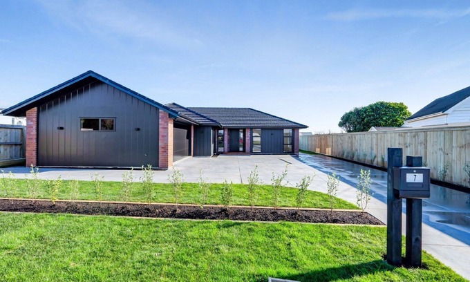 Bell Block Villa | Family home with Game zone and Outdoor fireplace, Sleeps 10.