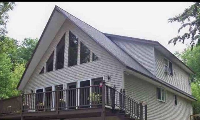 Shrewsbury Ski Chalet | Family Retreat! Large Game Room, fenced in yard with hot tub and fire pit.