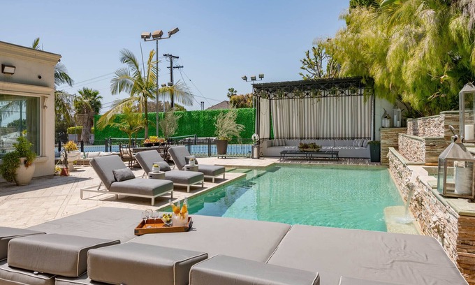 The Flats House | Family Vacation Dream: Privately Gated Mansion Tennis Court and Walk to Rodeo Dr