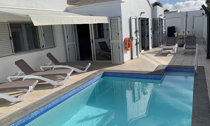 Puerto del Carmen Villa | Fantastically much modern space, private pool and the beach within easy reach