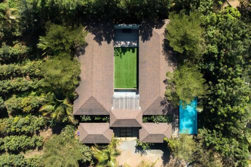 Nashik Villa | Farmhouse Retreat by StayVista - Classic architecture, Rustic interiors, Cozy rooms & A refreshing swimming pool