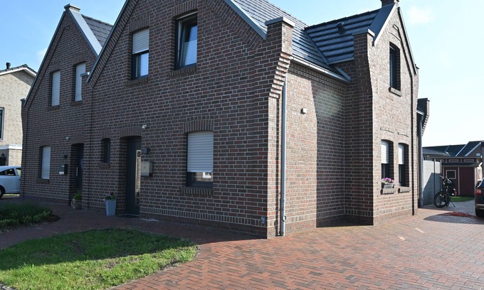 Papenburg House | Feel-good vacation home with a view of the natural lake from the terrace