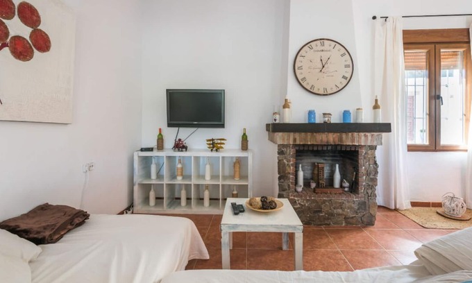 Casabermeja Other | Finca Colors. It is a farm nestled in the natural landscape.