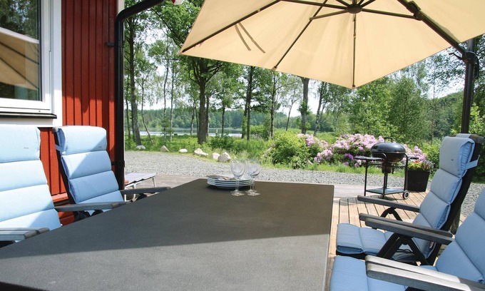 Perstorp House | Fine cottage on the edge of the forest with fireplace and large terrace on a lake property on the ed