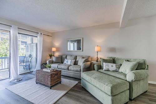 Oceanmarsh Subdivision House | First Floor Condo - Walking distance to beach and pools!
