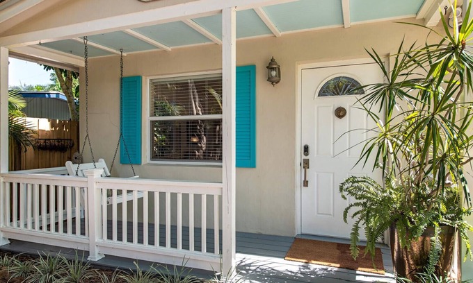 Central Naples House | Florida bungalow with loads of charm in tropical and private setting.