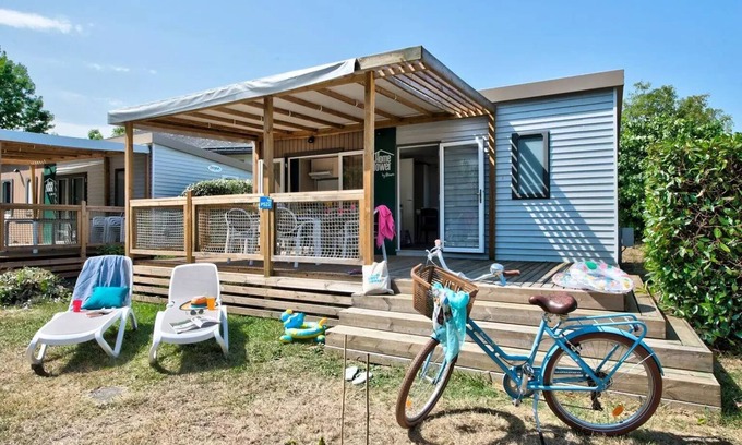 Saumur House | Flower Camping L'Ile d'Offard * - Homeflower Premium 26.5m2 (2 bedrooms) + CLIM + semi-covered terrace + TV + sheets + towels 5 people