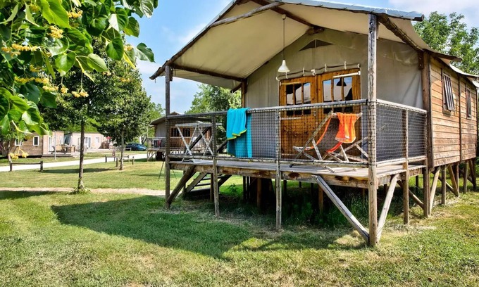 Souillac House | Flower Camping Les Ondines * - Cabane Lodge Wood on stilt Comfort 38m2 (2 bedrooms) including covered terrace 12m2 + TV 4 persons