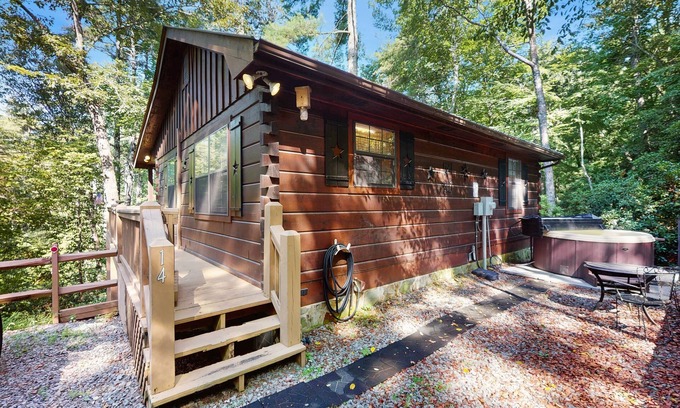 Cherry Log Cabin | Forest view cabin with private hot tub, furnished deck, fireplace, and grill