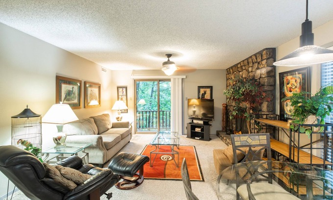 Mount Ida Condo | Forest view two bedroom, two bath condo on Lake Ouachita, steps away from pool and spa. by RedAwning