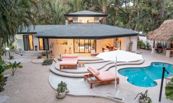 Carmen Villa | Four Bedroom Beach Villa, Right Next to Banana Beach. Steps from the beach.