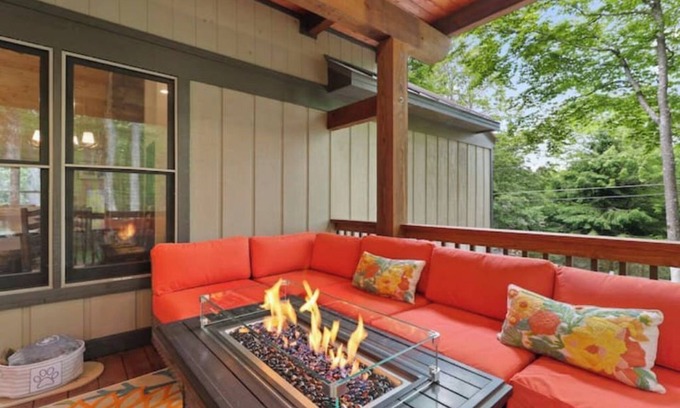 Charter Hills Cabin | French Flair Designed Custom Cabin with covered porch and gas firepit