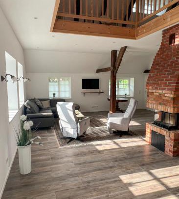 Stadland Apartment | Friesenhaus Ebbe für 6 Gäste mit großem Garten