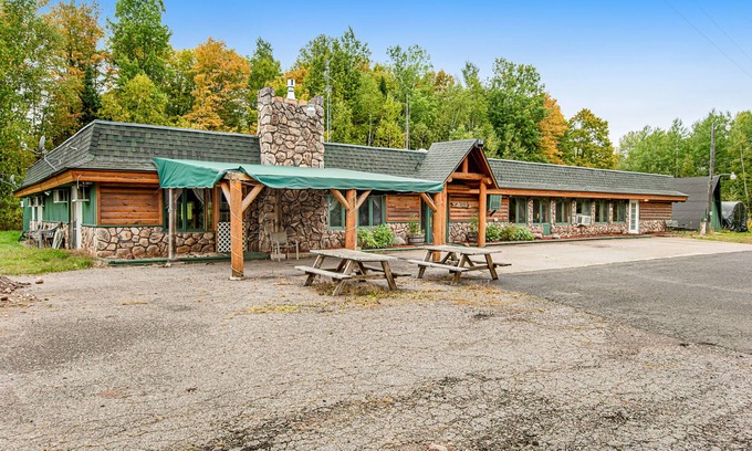 Presque Isle Cabin | Full hotel with bar, commercial kitchen, pool table & fireplaces - dog-friendly