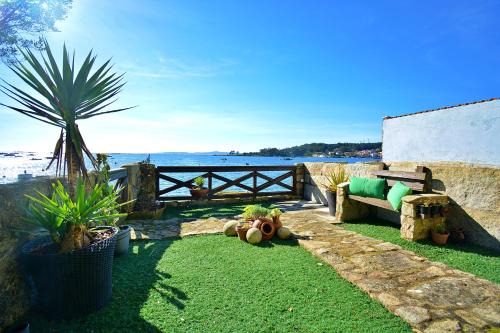 Isla de Arosa House | GALIHOST - Casa bañada por el mar en A Illa de Arousa