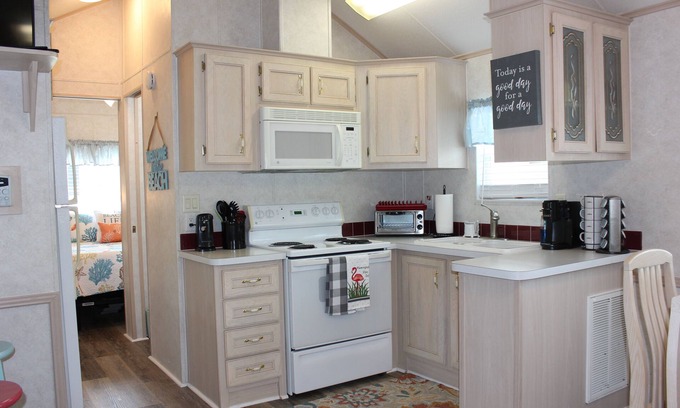 Upper Grand Lagoon Cottage | Gated resort offering relaxed, quite atmosphere. Minutes to beaches, restaurants