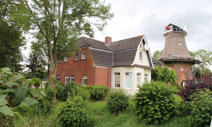 Uttum Apartment | Gemütliche Erdgeschosswohnung im Müllerhaus der Uttumer Mühle