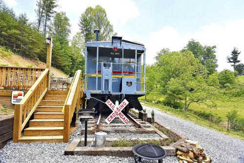 Clyde House | Glamping Caboose Rental Perfect for Families near Clyde, North Carolina