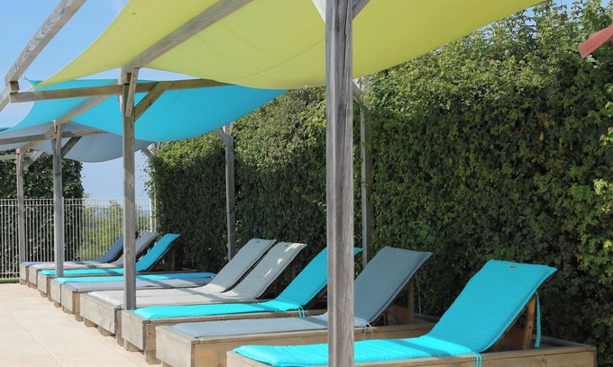Jayac RV Rental | Glamping 'Safarilodge Prestige Tent 14 4 Pers' with Shared Pool, Private Terrace and Wi-Fi