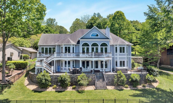 North Shore House | Go Jump In the Lake! Just Listed Custom Lakefront Home with Dock & Amenities!