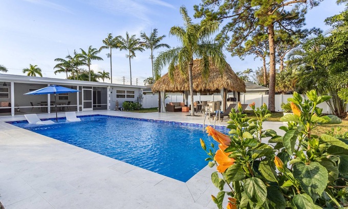 Boynton Beach House | Golfers Green Retreat with 35' Heated Pool & Tiki. Pet Friendly!