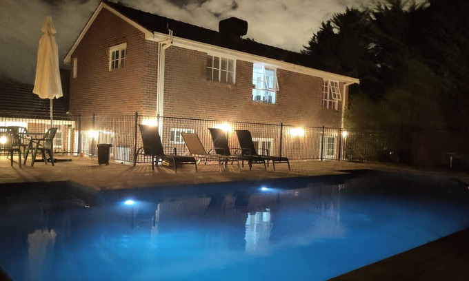 Eltham House | Gorgeous 4-Bedroom Home & Venue on a Mansion - an acre land with Pool & Garden n