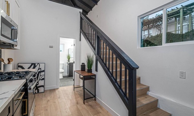 Valencia Park Apartment | Gorgeous Loft guesthouse with views of the city! 15 Minutes to the beach!