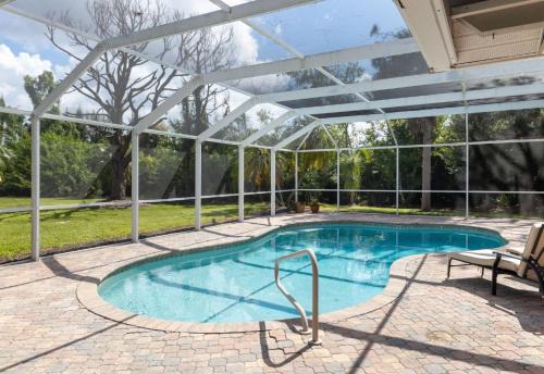 Iona House | Gorgeous Ranch Style Pool Home on One Acre Lot