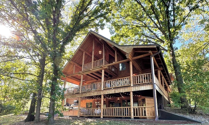 Lawndale Cabin | Gorgeous XL Log Cabin in Bloomington, IL! 2 Game Rooms + Hot Tub & Sauna!