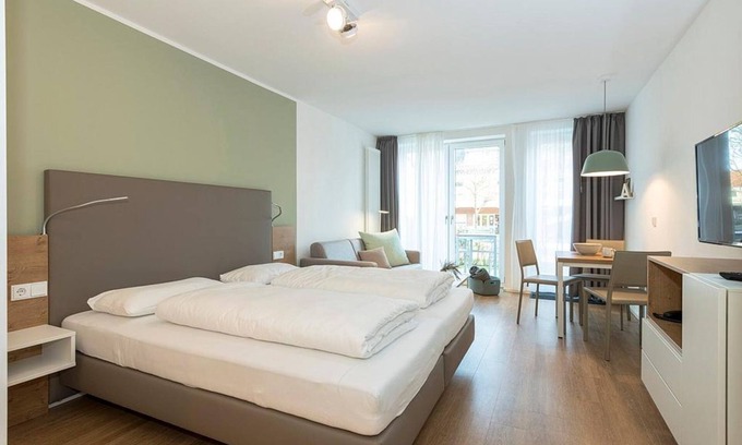Langeoog Apartment | Great apartment close to the beach with sunny south-facing terrace and sauna area in the house