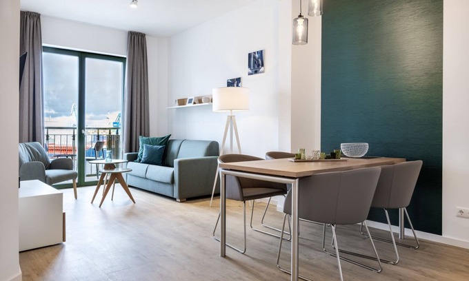 Wismar Apartment | Great apartment in harbor location with balcony and view of the maritime harbor life -