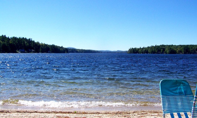 Acton Cottage | Great East Lake cottage across camp road to a large sandy shared beach. View2NH!