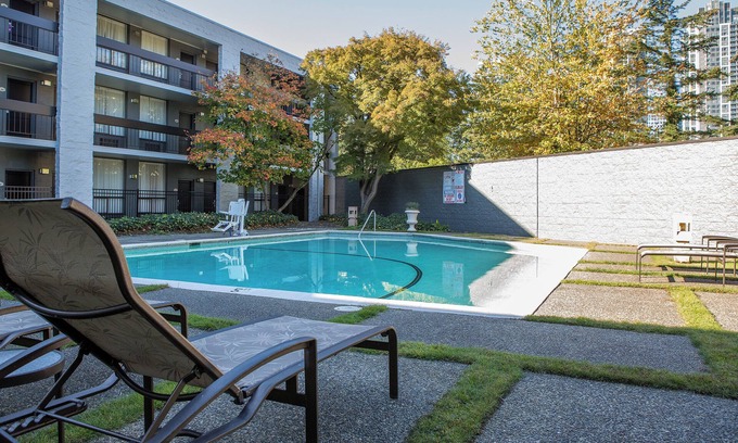 Wilburton Hotel | Great Location & Amenities! Private Parking, Outdoor Pool, Pets Allowed!