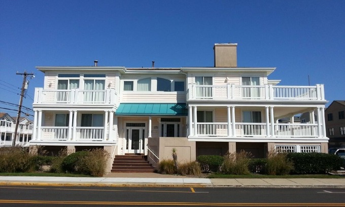 South End Condo | Great Summer Getaway! Steps to Beach, Ocean views and large wraparound deck