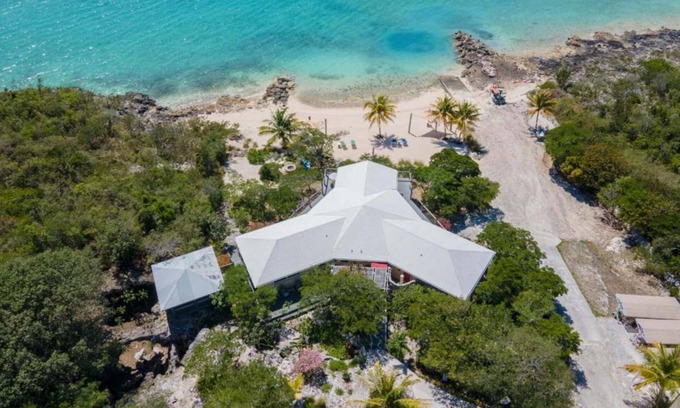 Salt Pond House | Grotto Bay: 5BR Villa w/Private Beach