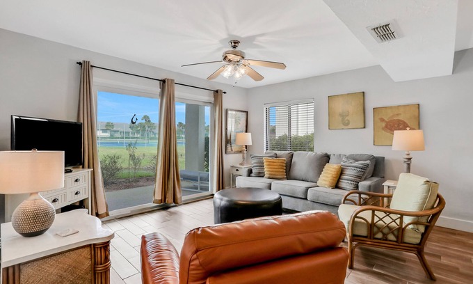 Butler Beach Condo | Ground-floor condo next to the tennis courts with 2 pools, sauna, beach access
