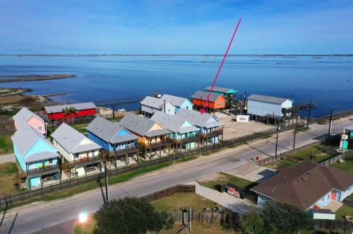 Flour Bluff House | Group Getaway w Pool, Boat Dock 2 Homes Laguna Village Retreat by AvantStay