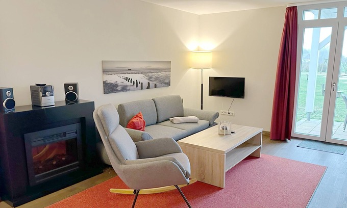 Wremen Apartment | Hübsche, Strandnahe Ferienwohnung mit Eigener Sauna und Terrasse mit Strandkorb