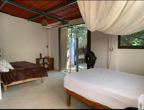 Barra de Colotepec House | Habitación 2 camas internet Starlink
