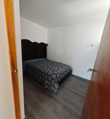 Atico House | Habitacion con Cochera