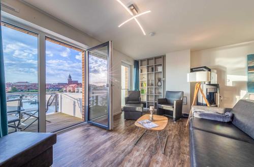 Muritz Apartment | Hafenflair- Apartment mit Balkon & Kamin in der Hafenresidenz