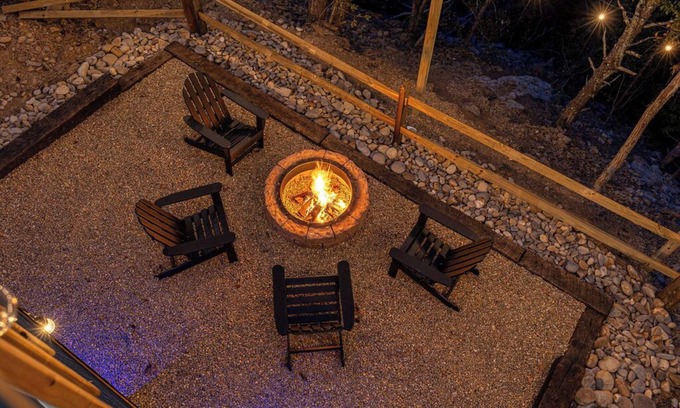 Sevierville Cabin | Happy Bear: Wooded Views, Fire-Pit, Game Room & Hot-Tub, Close to Attractions