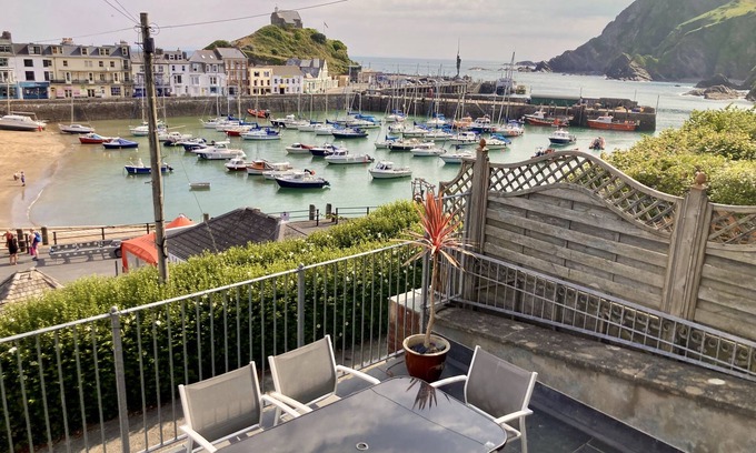 Hele Cottage | Harbourside 19th Century Cottage. Amazing Sea Views, Terrace and Garage Parking
