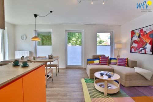Wangerooge Apartment | Haus am Dorfbrunnen Ferienwohnung Welle