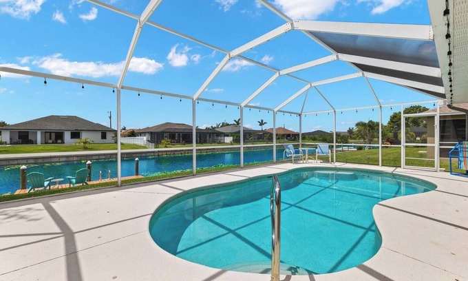 Trafalgar House | Heated Pool Plus Game Room on Fresh Water Canal