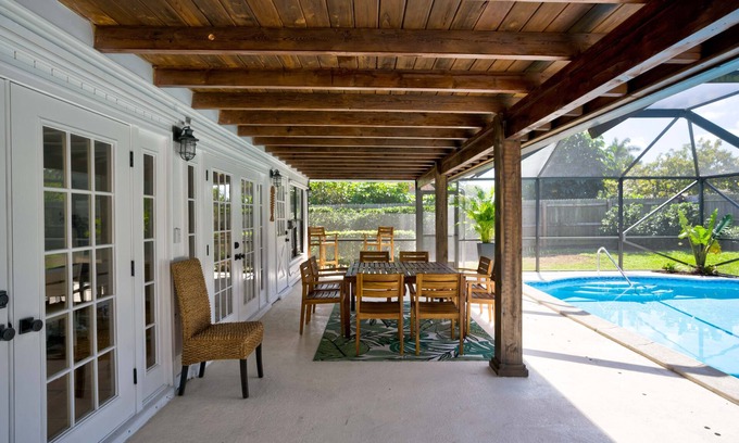 BallenIsles House | Heated Pool Modern Oasis Sleeps 9! Renovated! Dog Friendly!